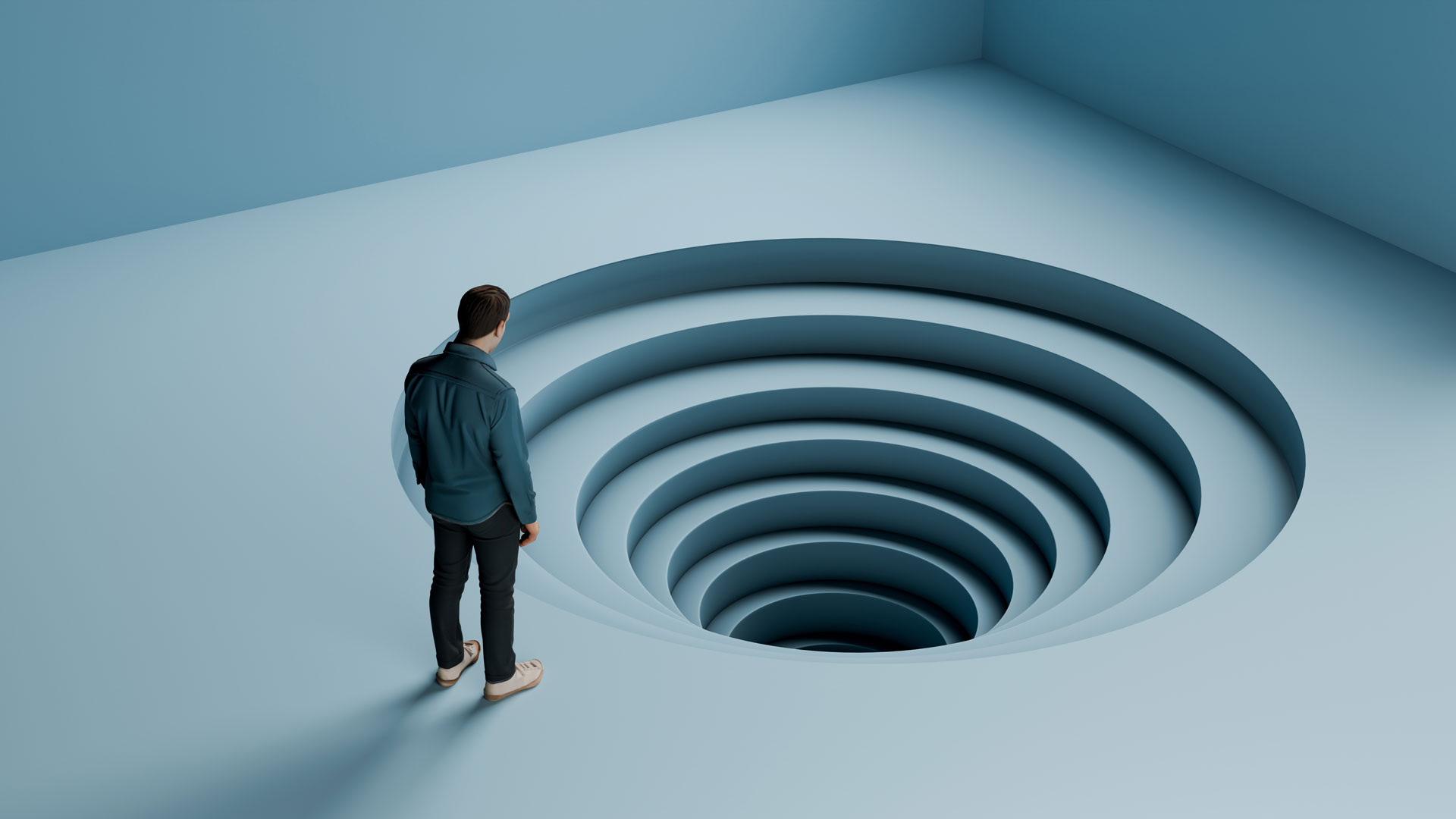 Abstract image of person staring down endless stairs
